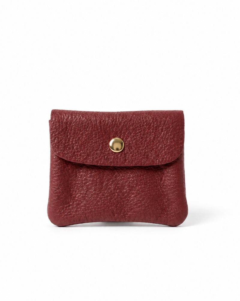 Cranberry pebble leather wallet collection featuring Mini Coin Wallet, Coin Wallet, and Cellphone Wallet in genuine leather, made in Italy.