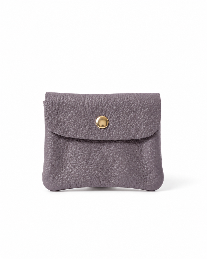 Lavender pebble leather wallet collection featuring Mini Coin Wallet, Coin Wallet, and Cellphone Wallet in genuine leather, made in Italy.