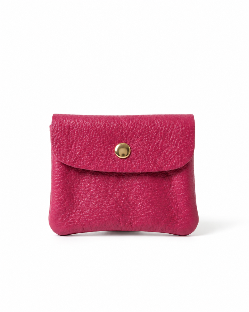 Magenta pebble leather wallet collection featuring Mini Coin Wallet, Coin Wallet, and Cellphone Wallet in genuine leather, made in Italy.