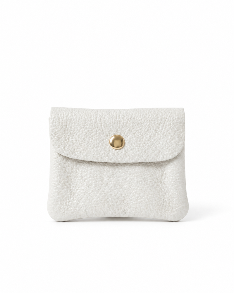 White pebble leather wallet collection featuring Mini Coin Wallet, Coin Wallet, and Cellphone Wallet in genuine leather, made in Italy.