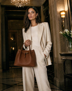 Woman carrying the Tourance Belladonna tote in Cognac, view 2