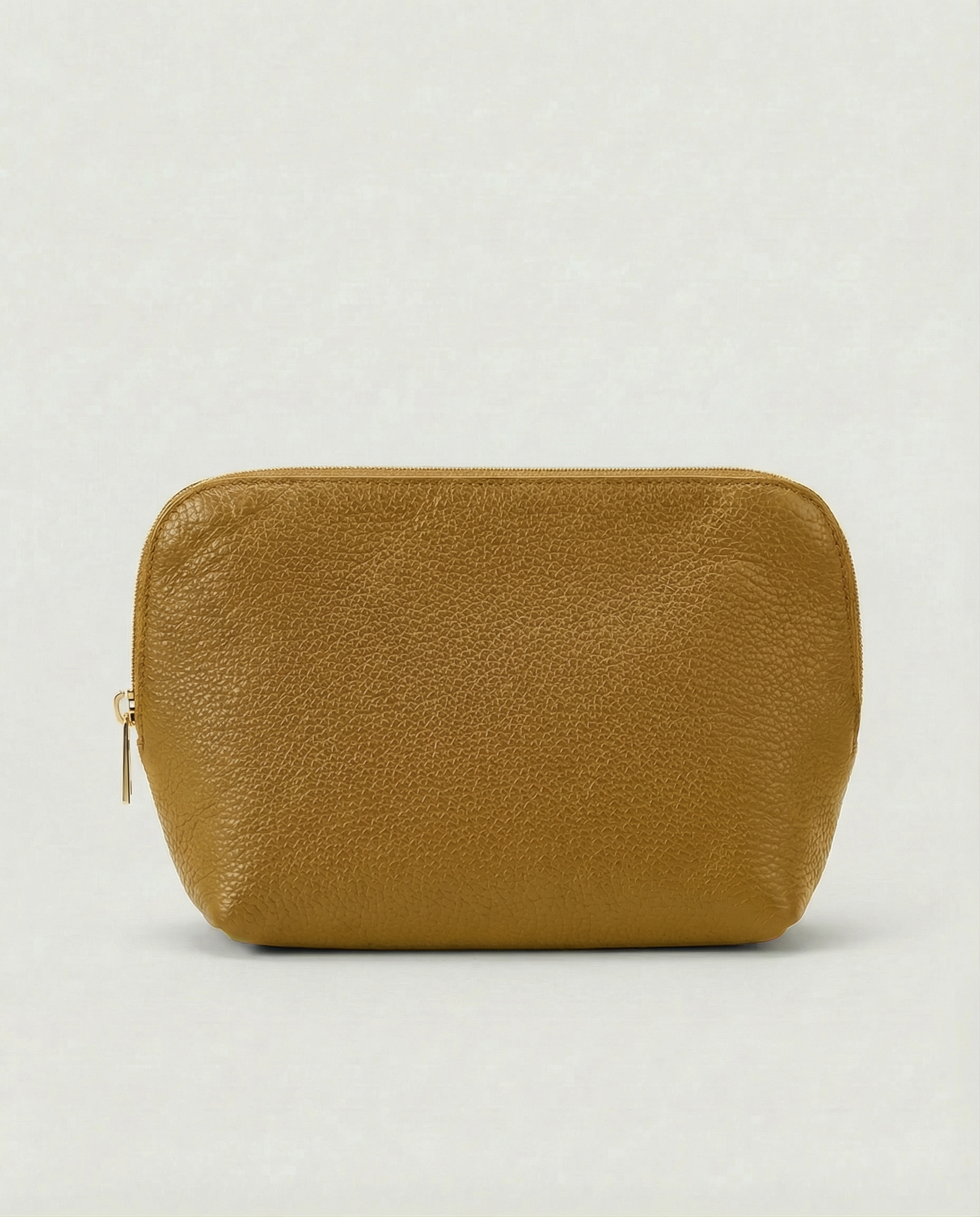 Pebble leather cosmetic bag with zip closure, available in mustard, structured silhouette for everyday essentials.