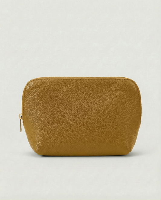 Pebble leather cosmetic bag with zip closure, available in mustard, structured silhouette for everyday essentials.
