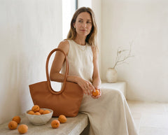 Woman carrying the Tourance Valdora shoulder tote, view 2