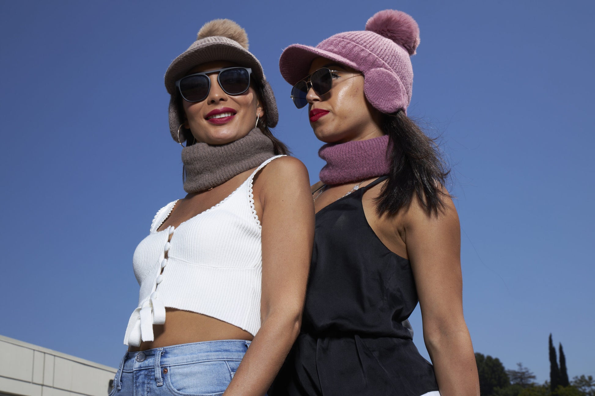 Two women with sunglasses wearing Tourance Oprah collection chiara