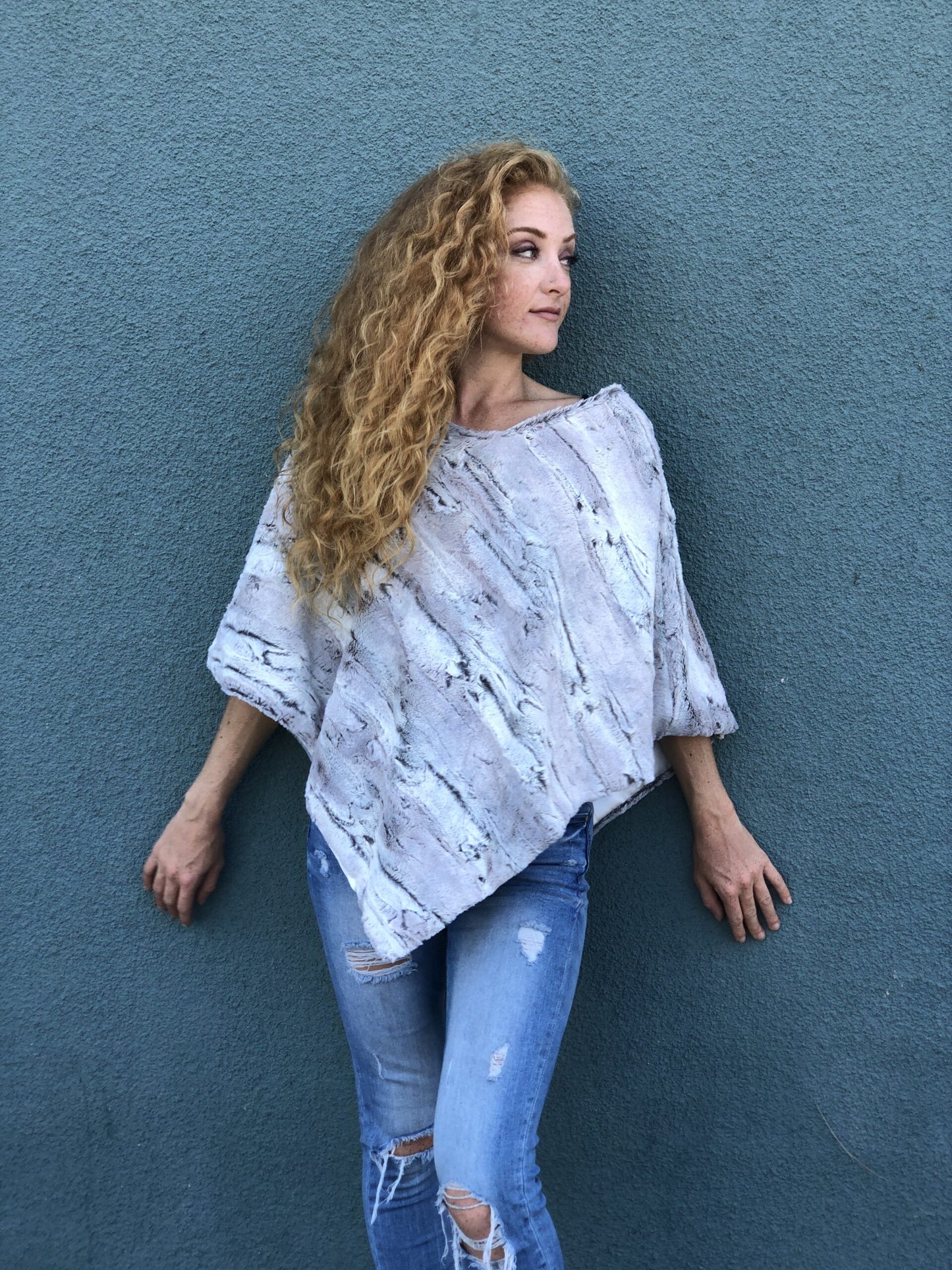 Woman wearing Poncho – Aspen Silver