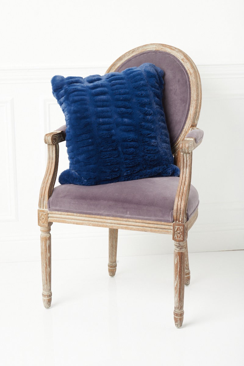 Another angle of Florence Navy Pillow on chair
