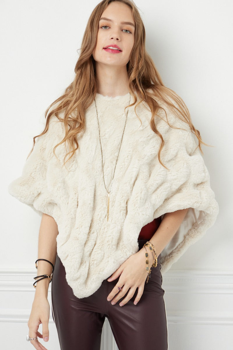 Woman wearing Florence Beige Poncho