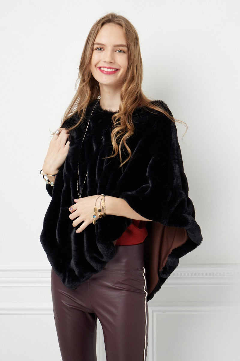 Woman wearing Florence Black Poncho