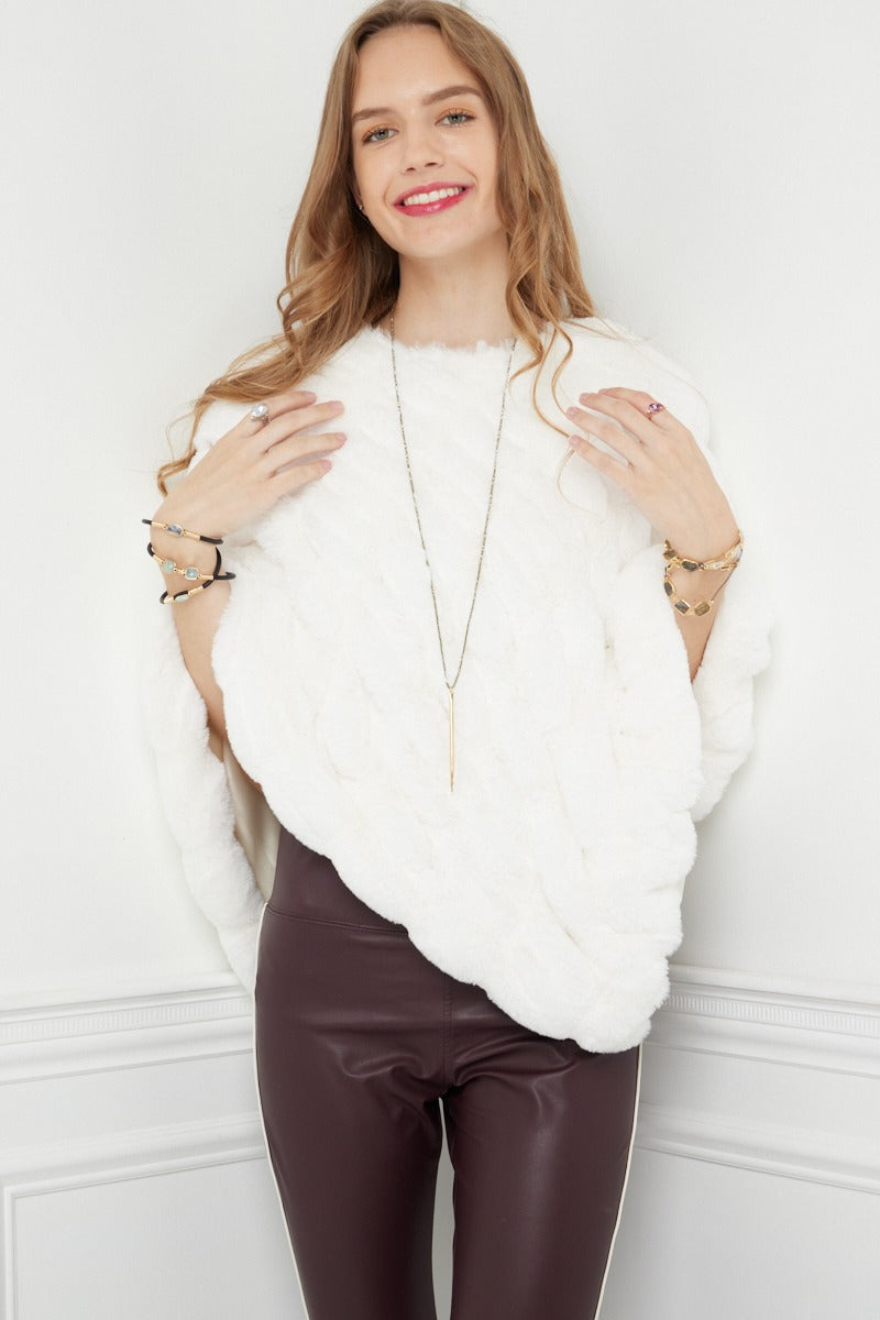 Woman posing wearing Poncho – Florence Ivory