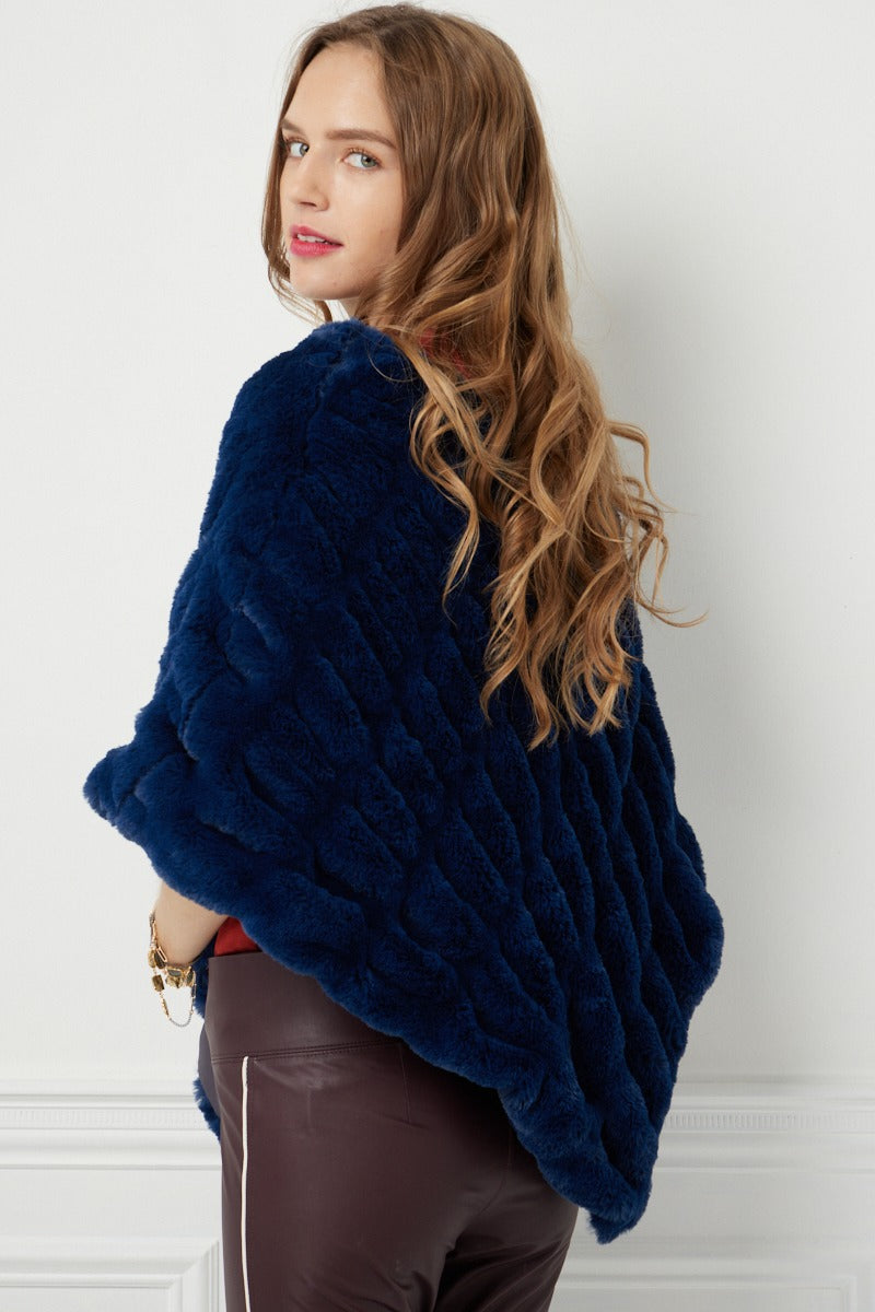 Rear pose of woman wearing Poncho – Florence Navy