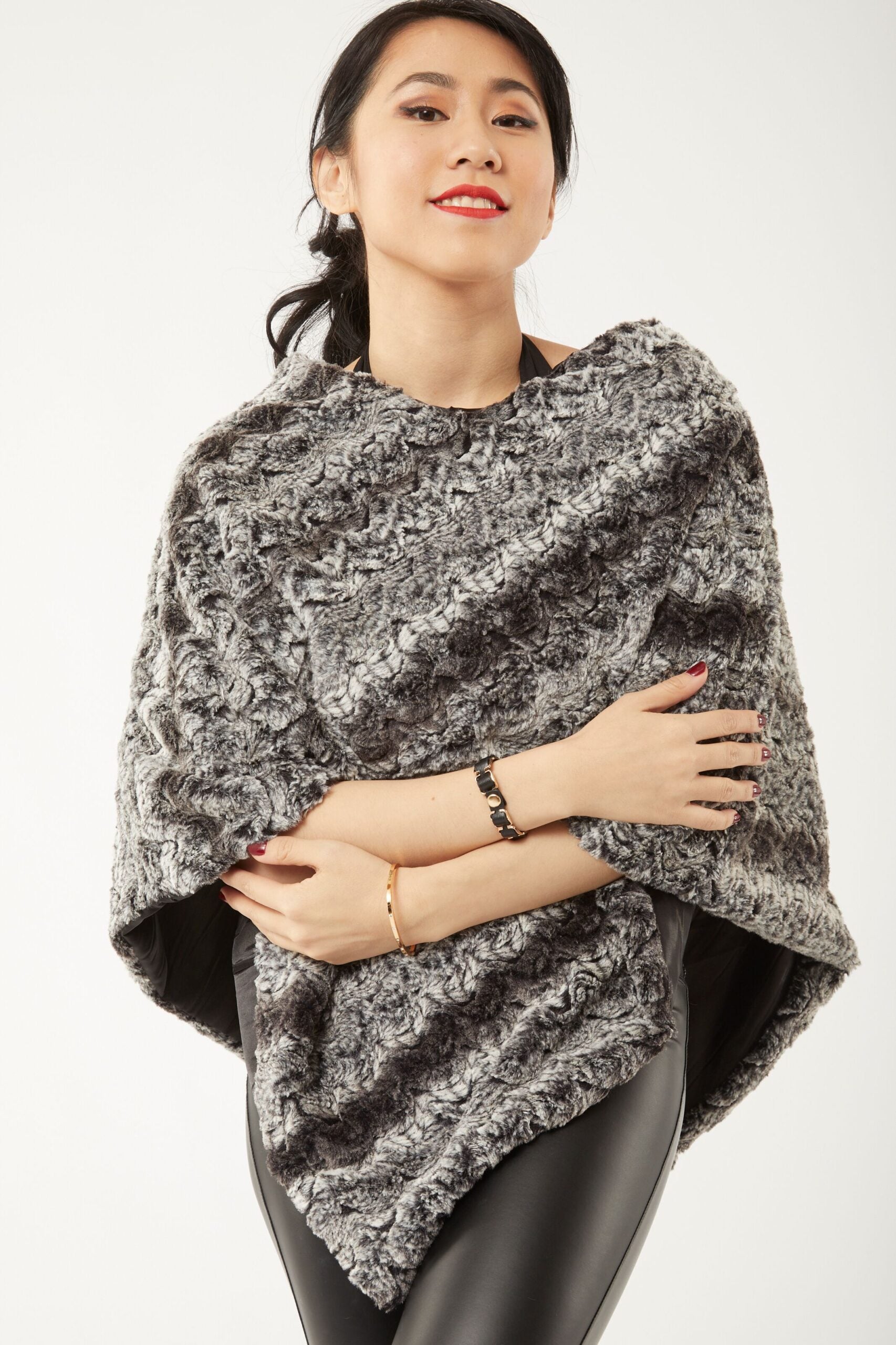 Alternate pose of woman wearing a Paloma Poncho – Chocolate and Black Color