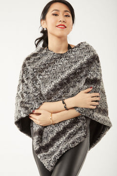 Alternate pose of woman wearing a Paloma Poncho – Chocolate and Black Color, view 3
