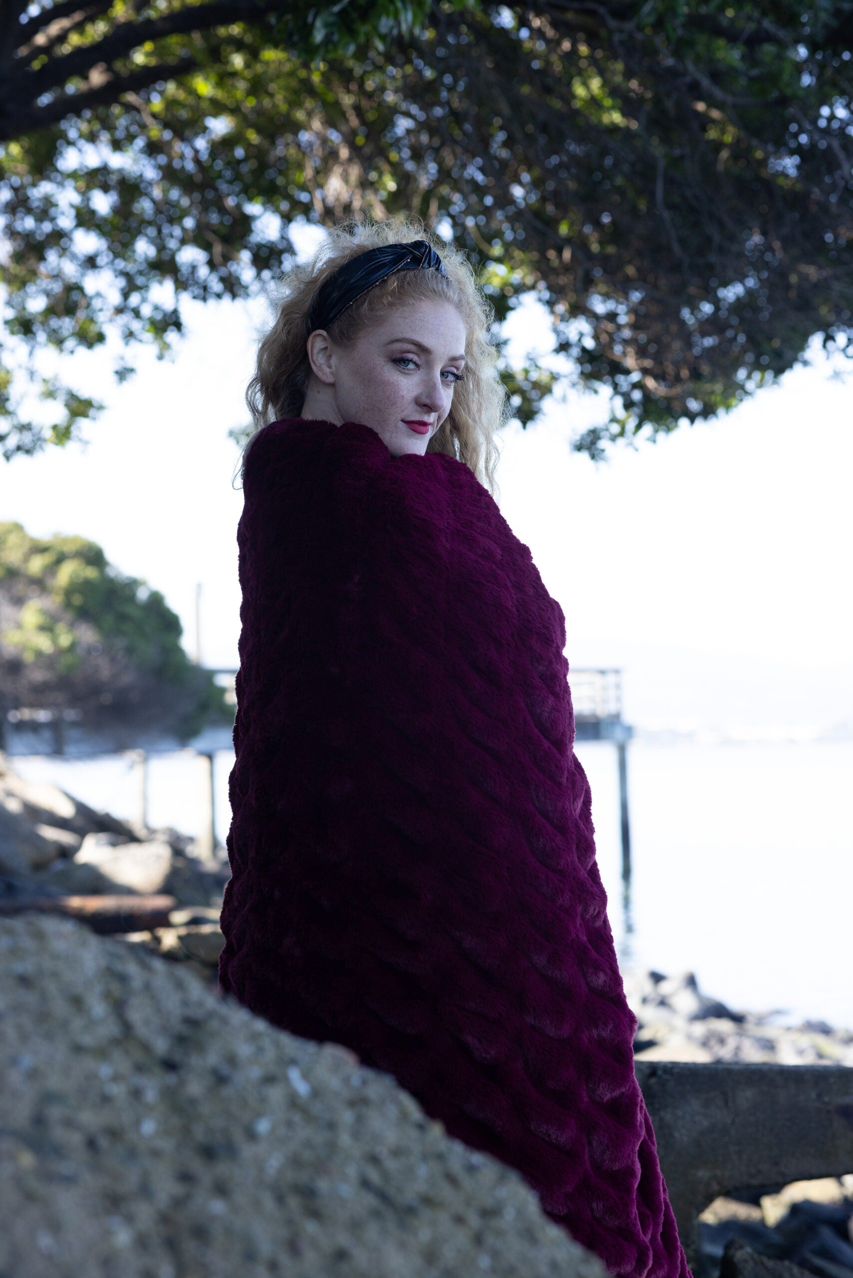 Woman wrapped with Throw – Florence Burgundy