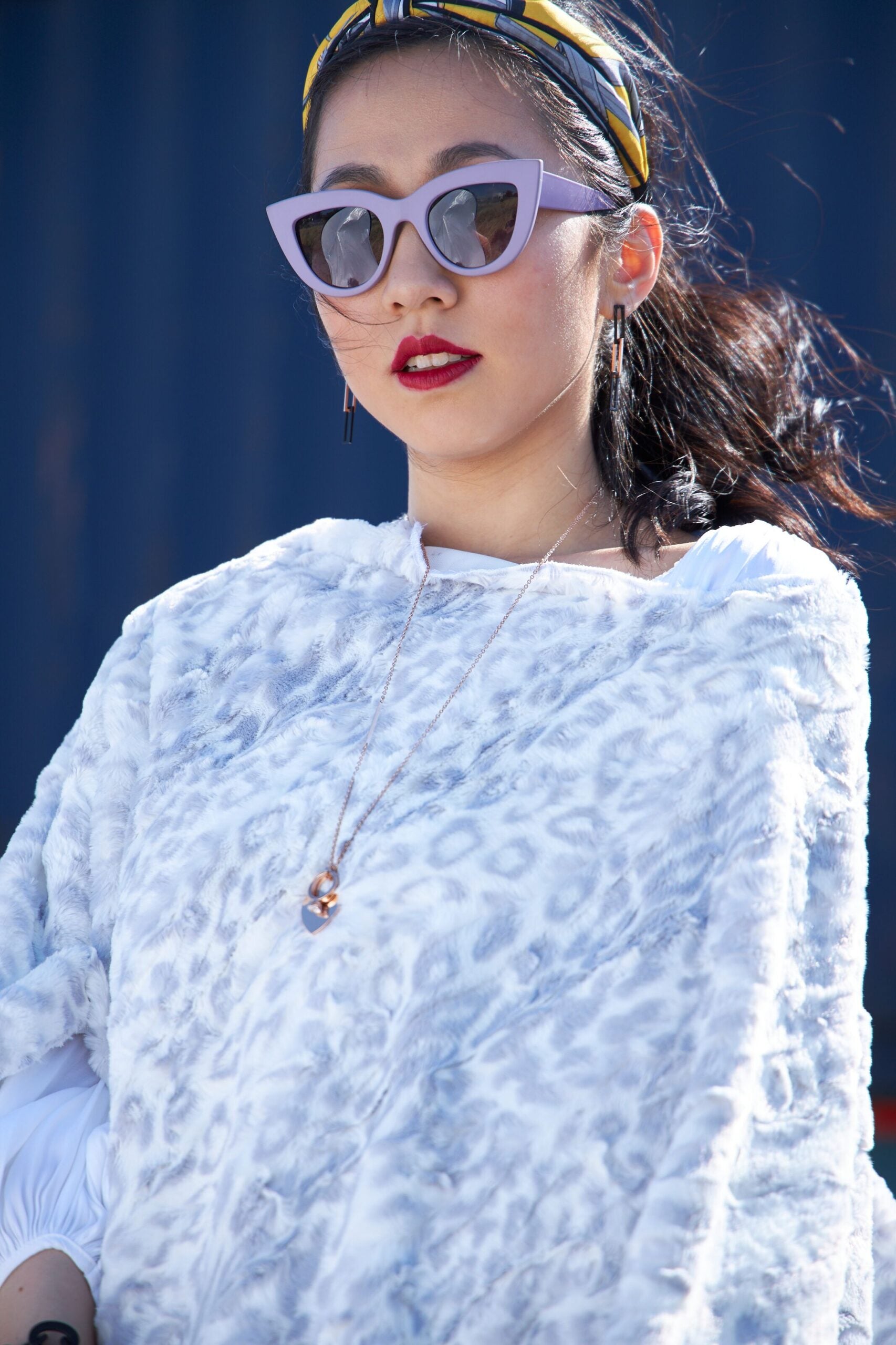 Woman pose wearing Cream and Silver Wild Jacquard Poncho