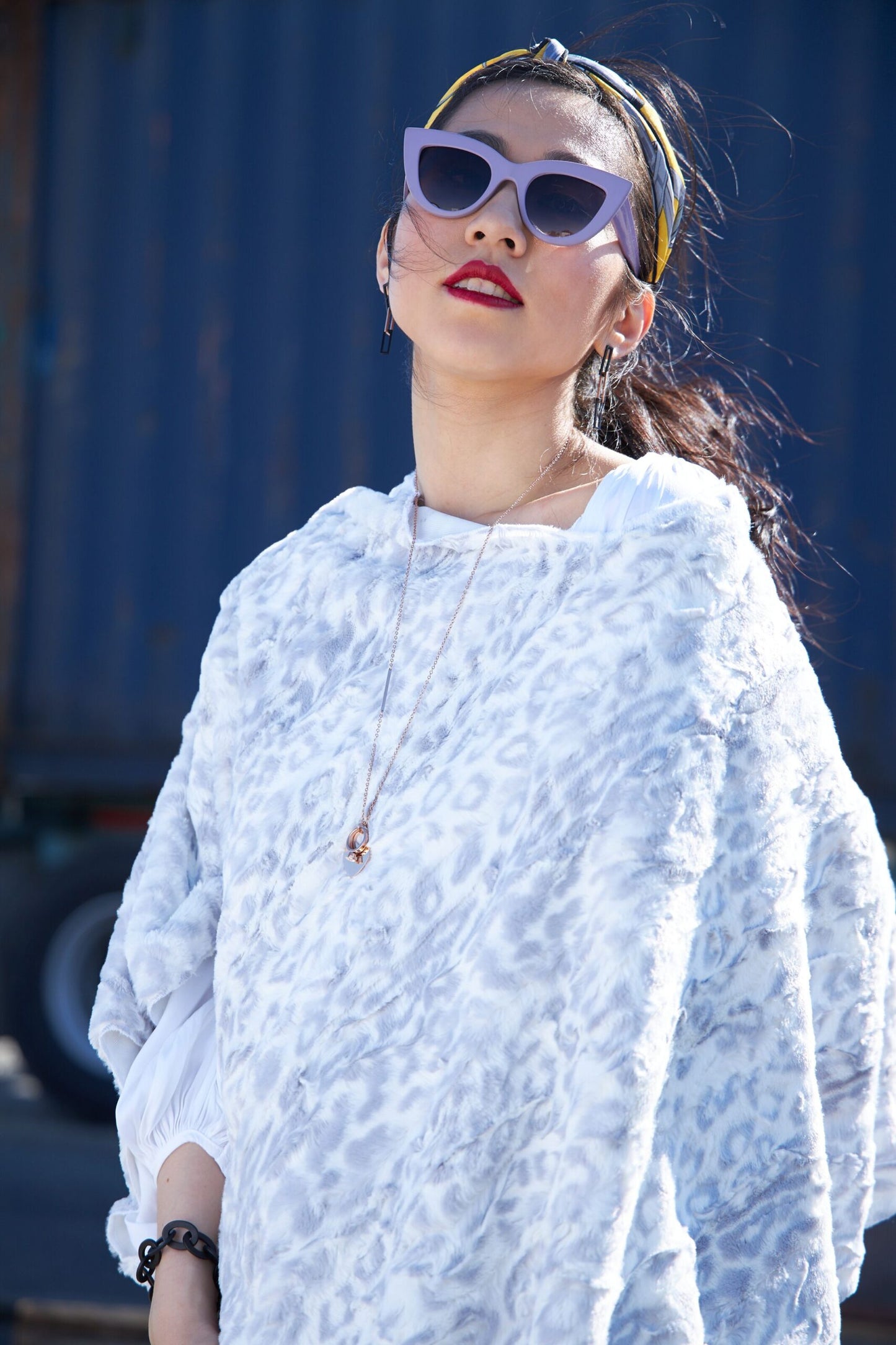 Alternative pose of a woman wearing a Cream and Silver Wild Jacquard Poncho