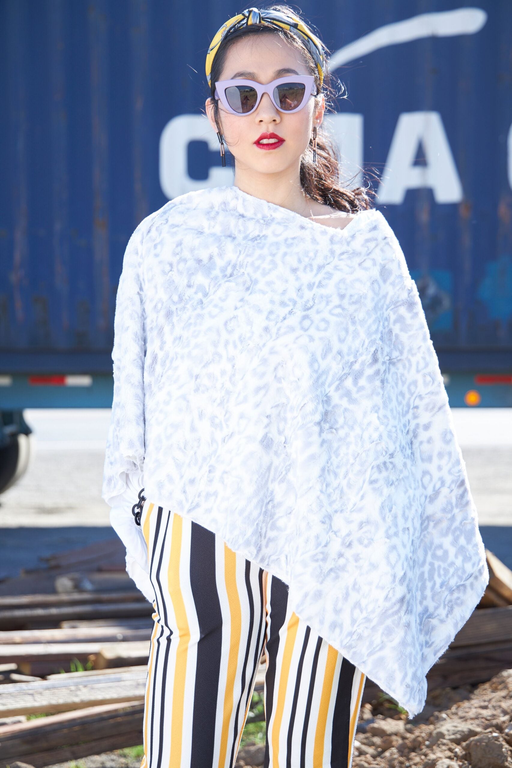 Woman wearing Cream and Silver Wild Jacquard Poncho
