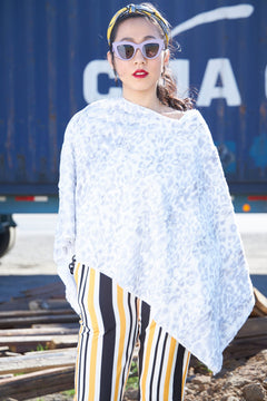 Woman wearing Cream and Silver Wild Jacquard Poncho, view 1