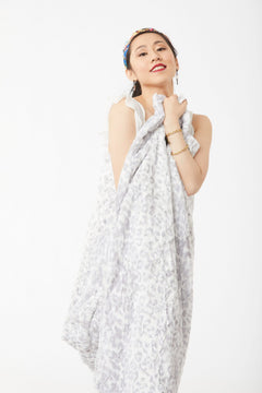 Woman wrapped wearing Wild Jacquard Luscious Throw – Silver, view 4